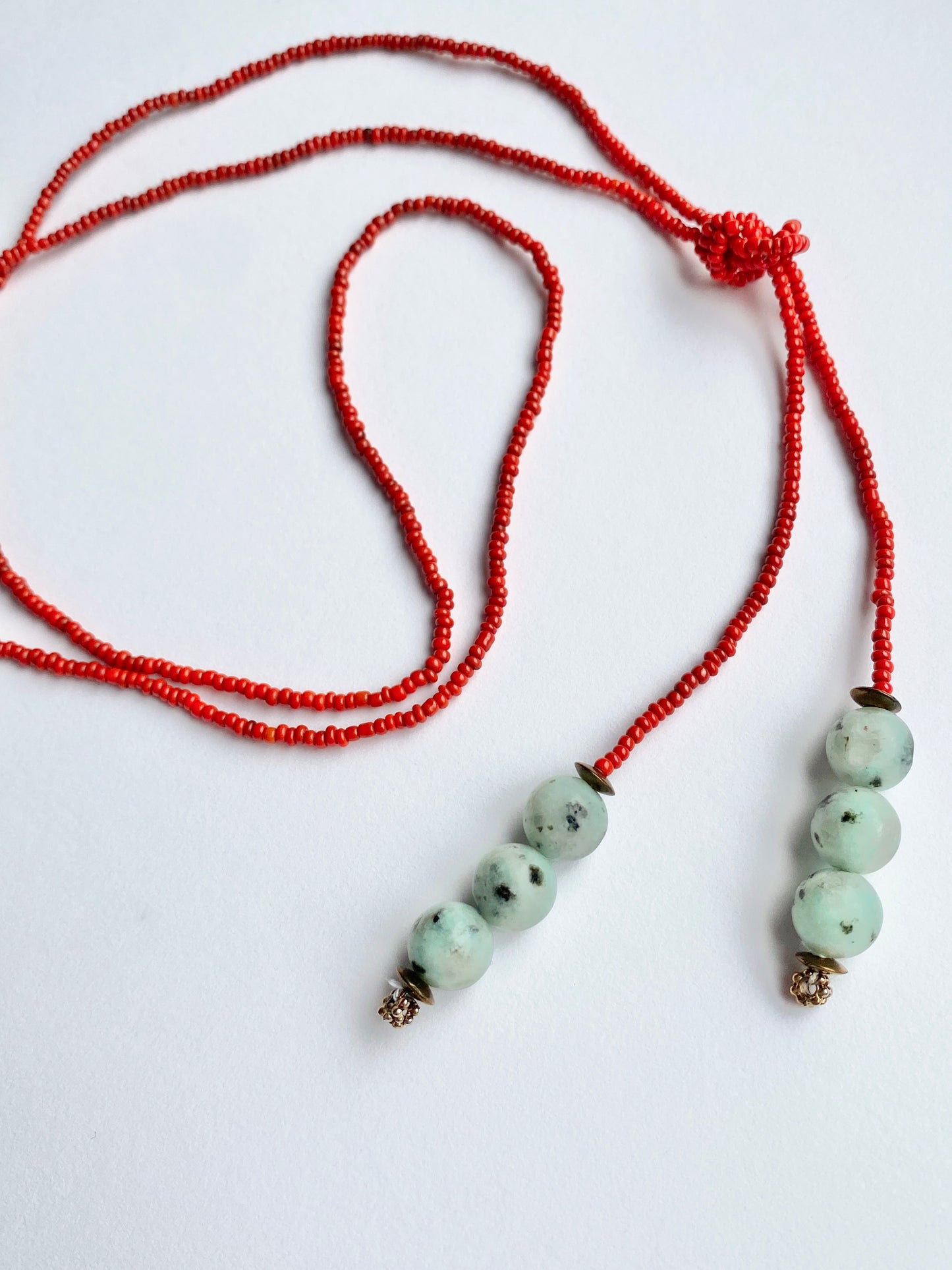 RED LASSO NECKLACE