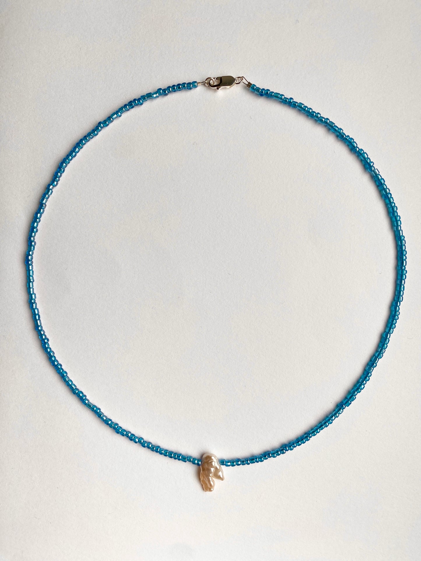 SINGLE PEARL BLUE NECKLACE